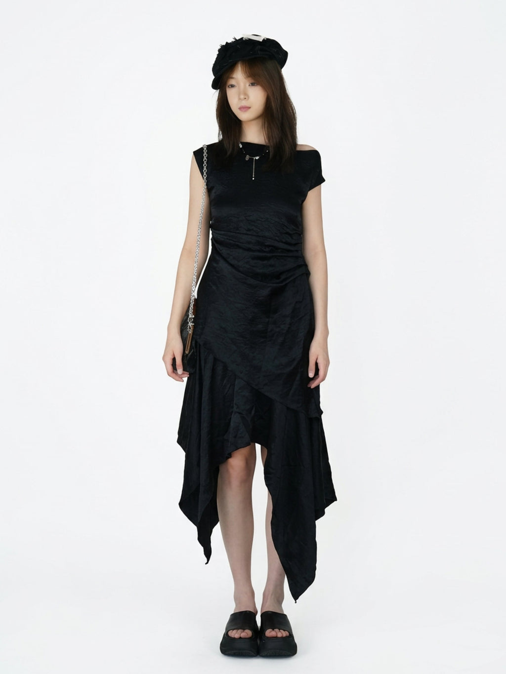 Saucer-wing skirt dress with a slanted neckline