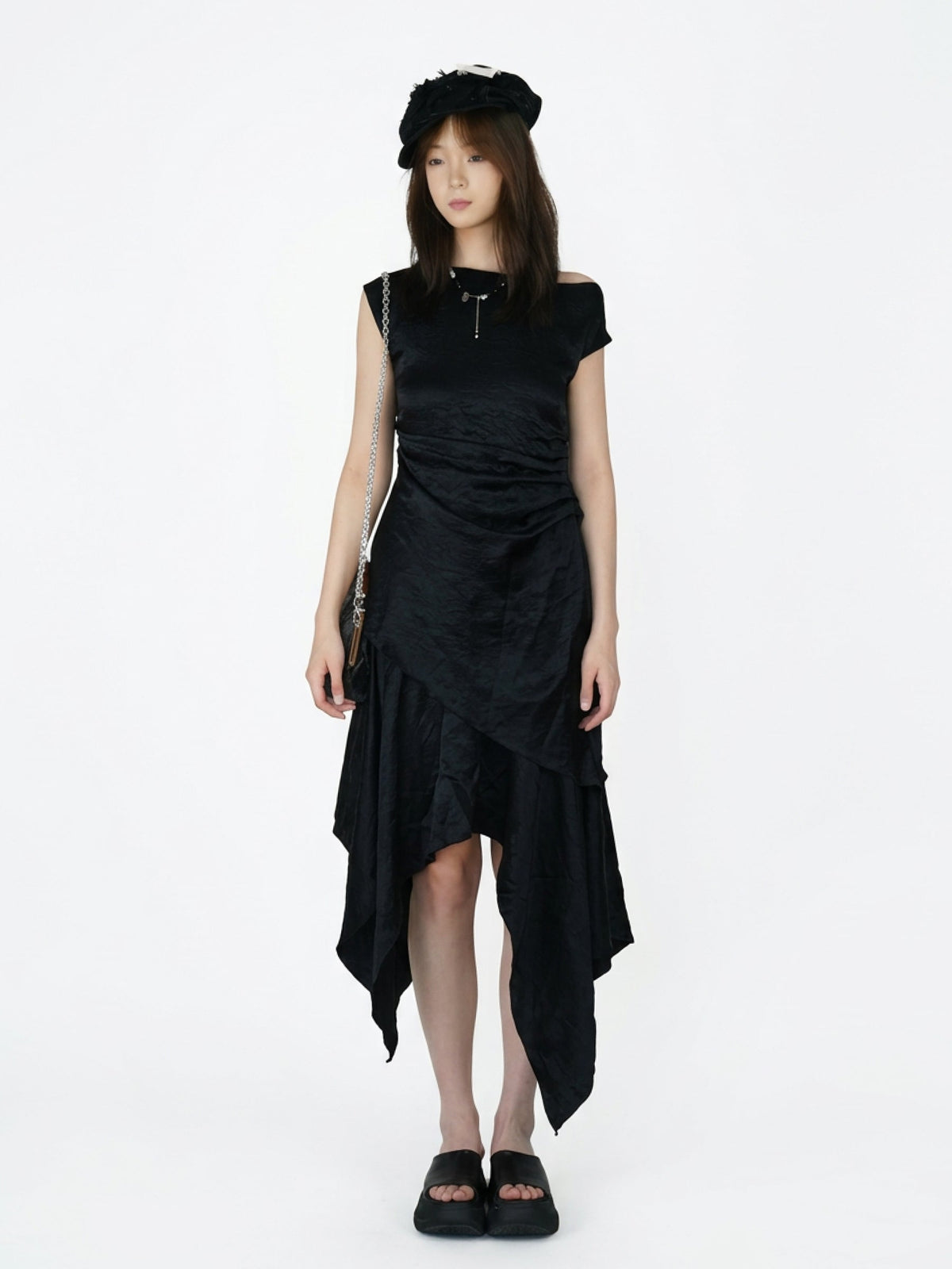 Saucer-wing skirt dress with a slanted neckline