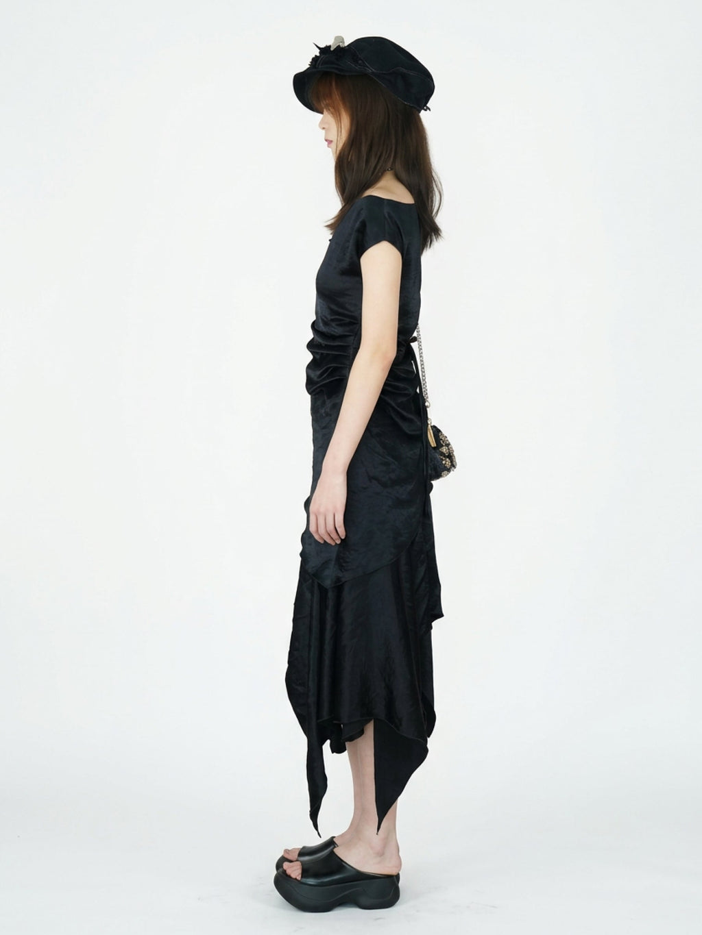 Saucer-wing skirt dress with a slanted neckline