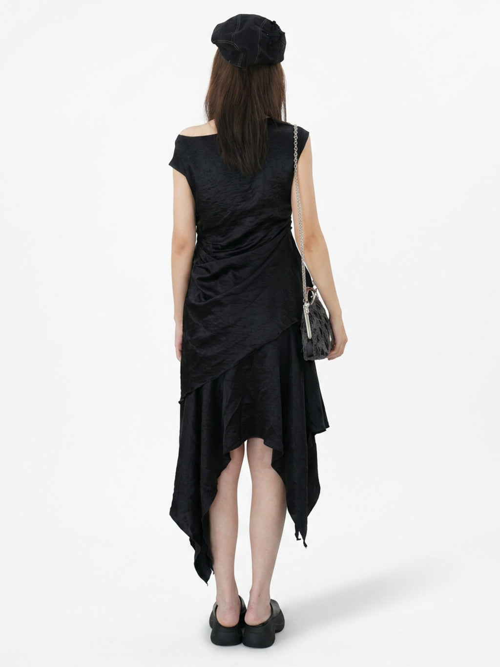Saucer-wing skirt dress with a slanted neckline